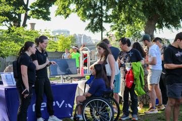 "Abilities: Amplified" attendees visit the REEV information table (Nancy Gong/Esplanade Association)